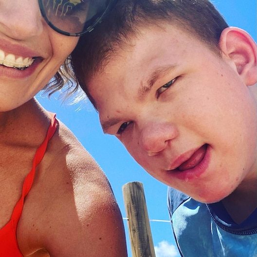 Woman and kid taking a selfie — NDIS Provider on the Sunshine Coast, QLD