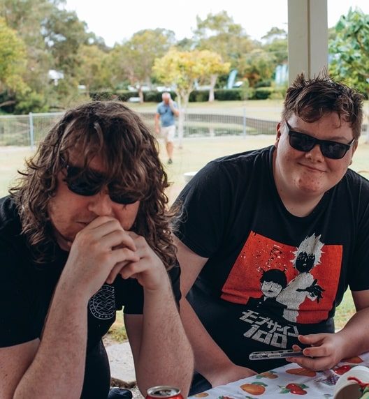 Two Men In Black Shirt — NDIS Provider on the Sunshine Coast, QLD